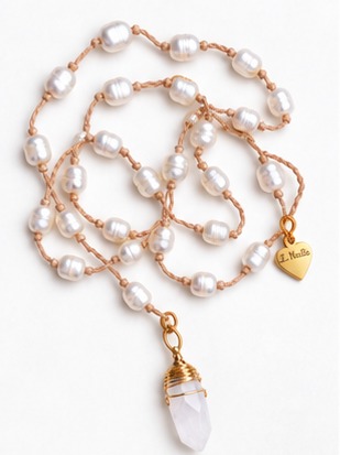 Faceted Clear Quartz Pendant with Ivory Fresh Water Pearls necklace — real close-up photograph