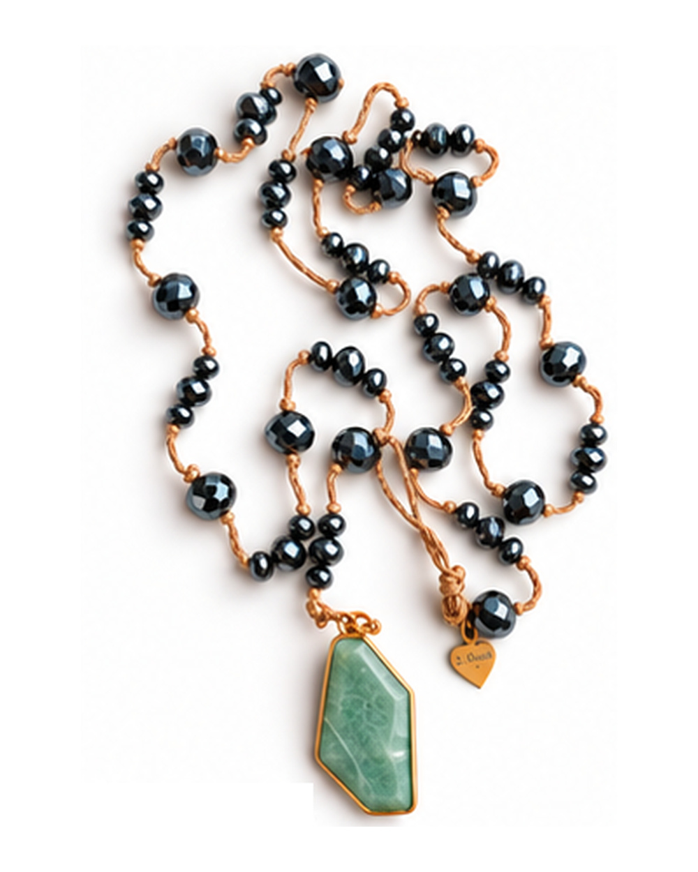 Light Green Jade Pendant with Hematite Crystals necklace — real close-up photograph