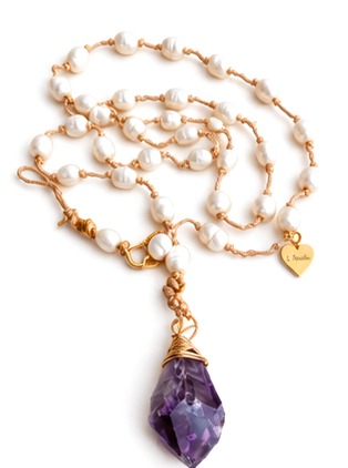 Faceted Amethyst Pendant with Ivory Fresh Water Pearls necklace — real close-up photograph
