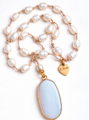 Moonstone Oval Pendant with Ivory Fresh Water Pearls necklace — real close-up photograph