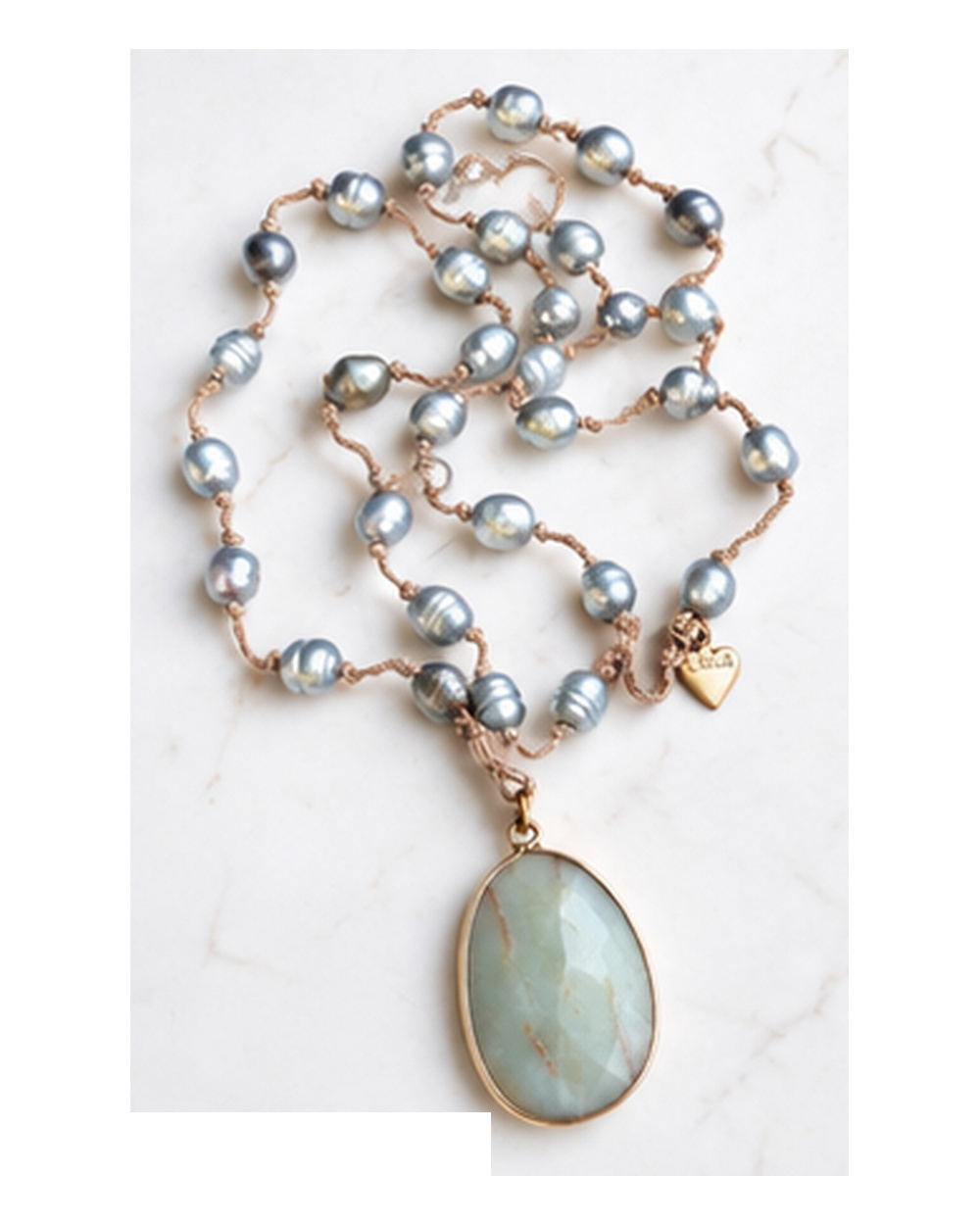 Light Green Turquoise Pendant with Grey Iridescent Fresh Water Pearls necklace — real close-up photograph