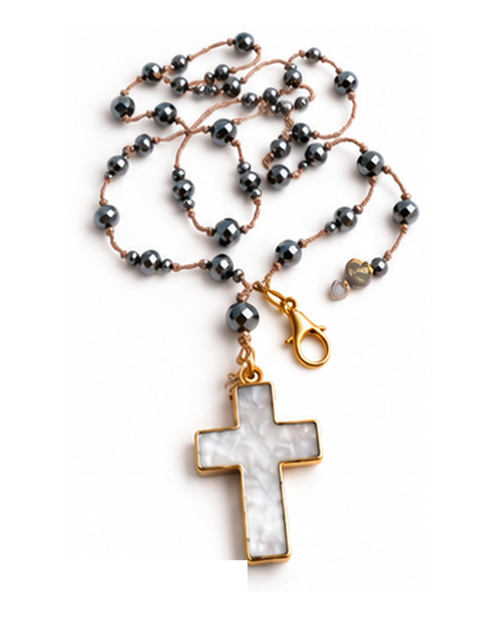 Mother of Pearl Cross Pendant with Hematite Crystals necklace — real close-up photograph